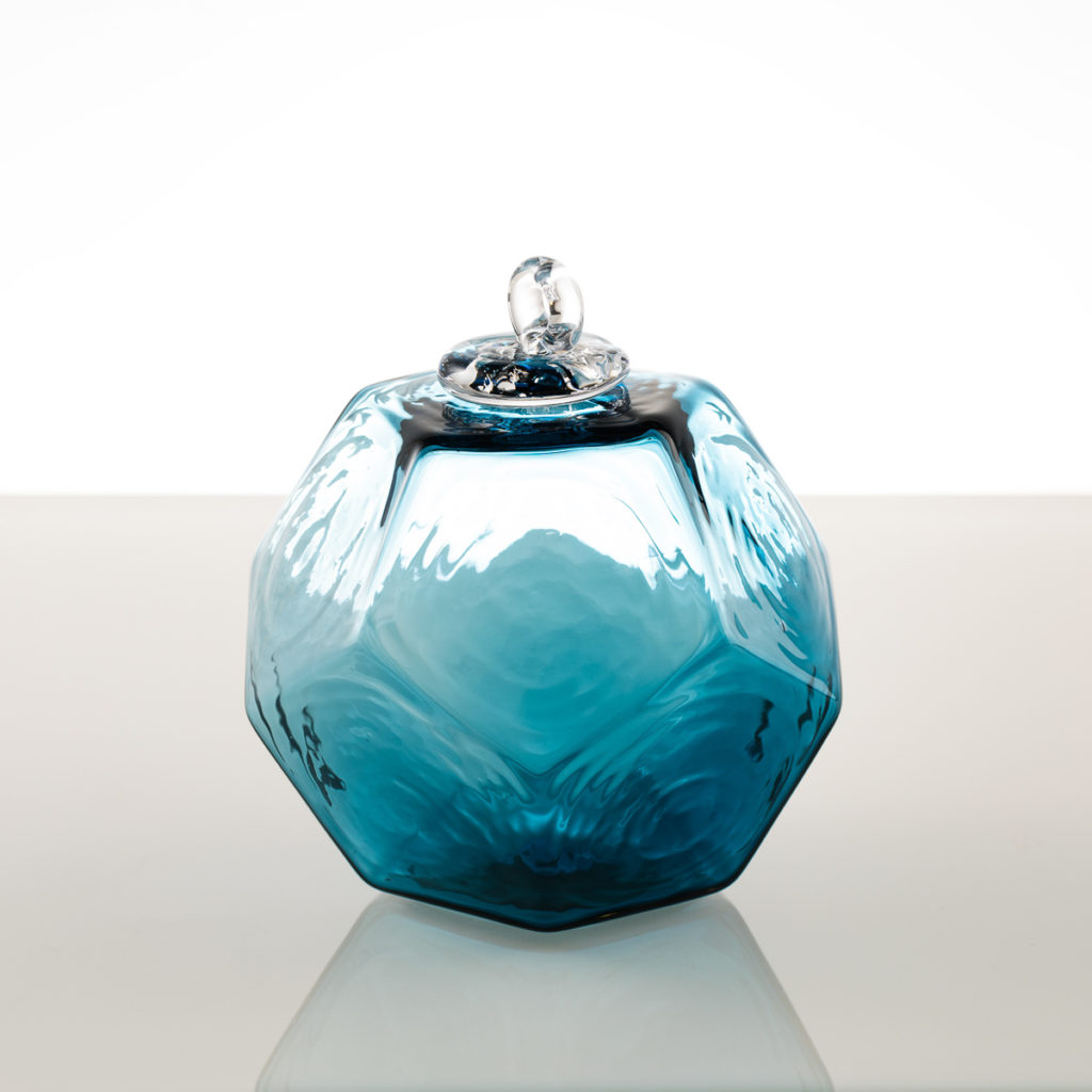 Photographie boule en verre rouge – Studio Valence