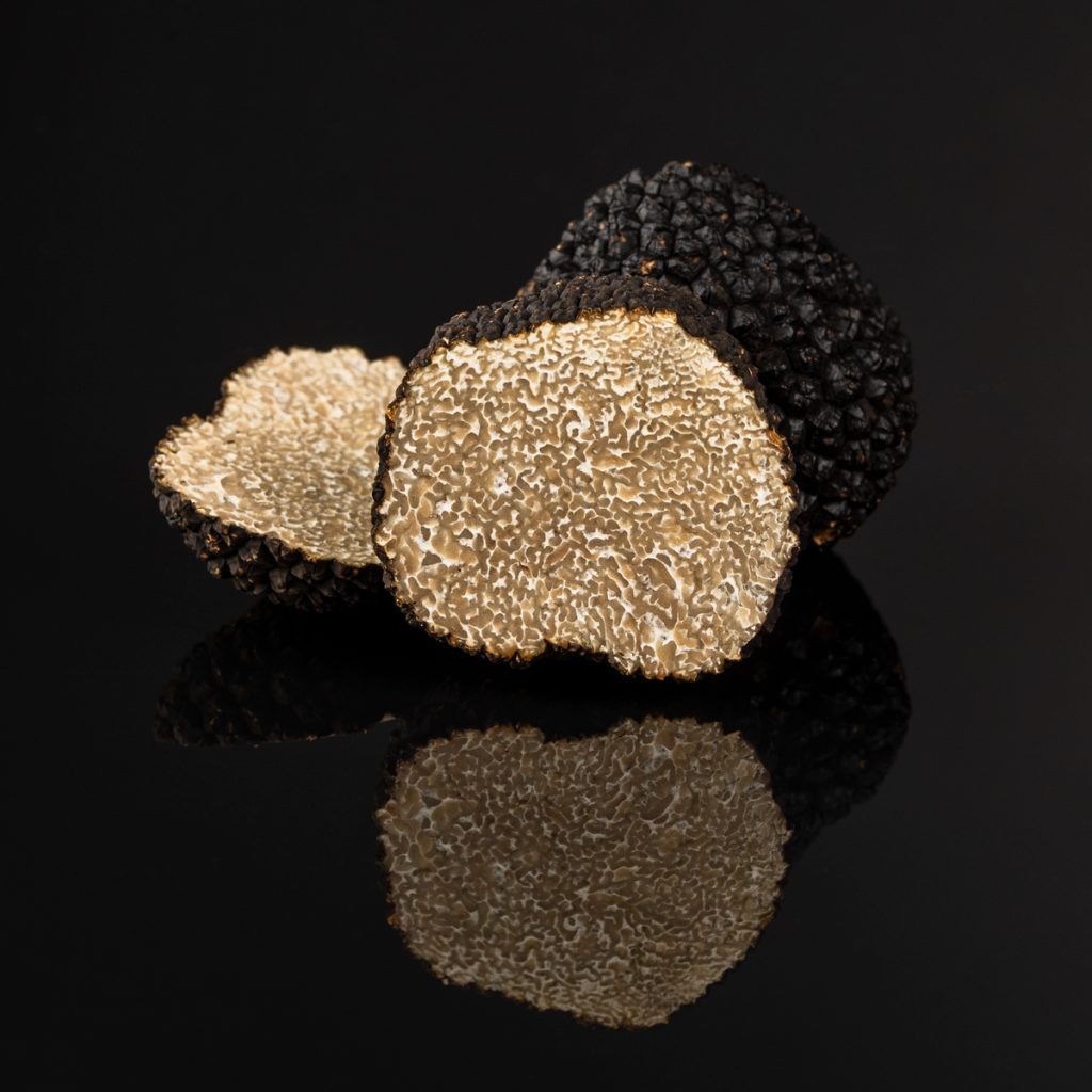 Truffe fraîche gros plan avec veinage – photographie culinaire premium Valence